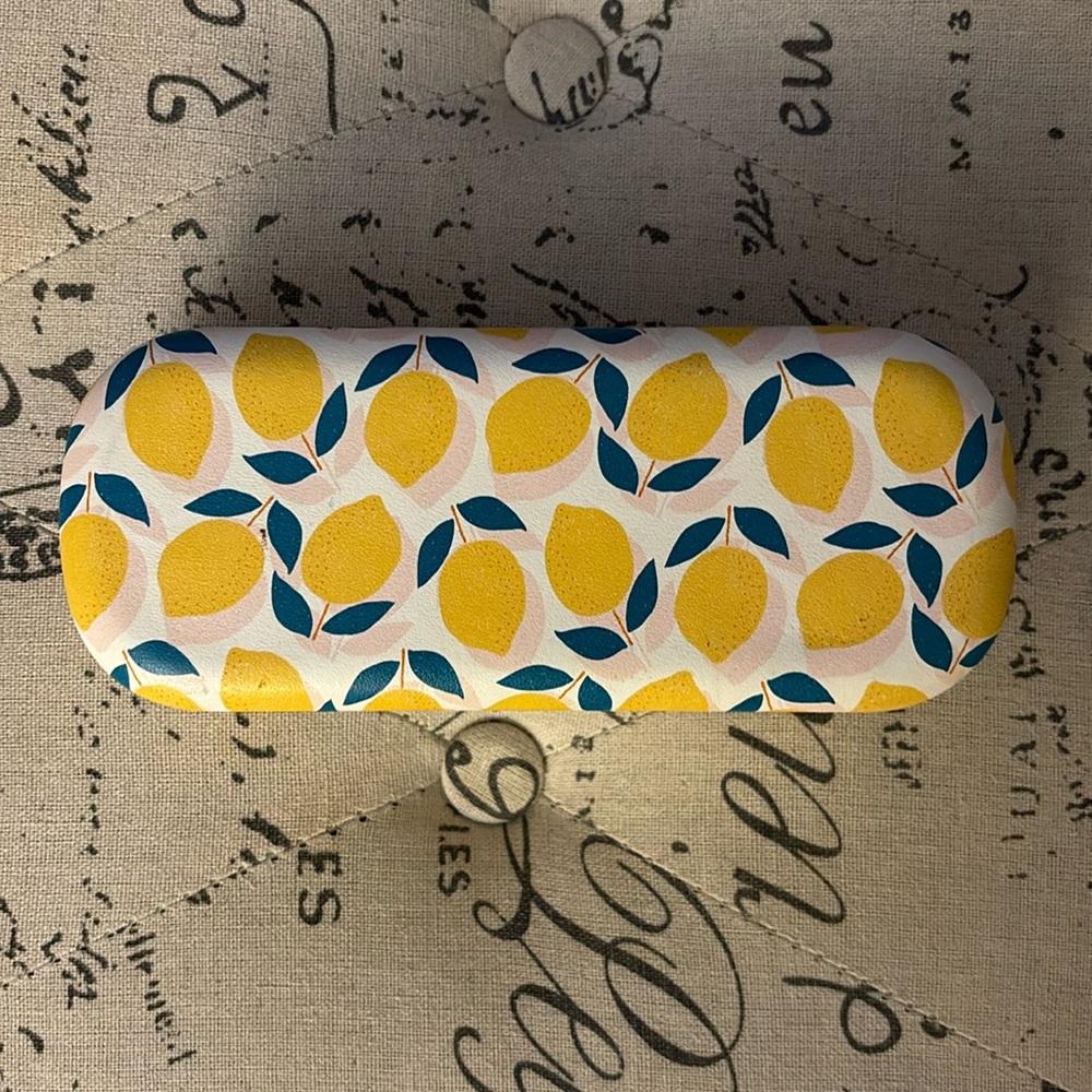 Brand new glasses case with lemon pattern.